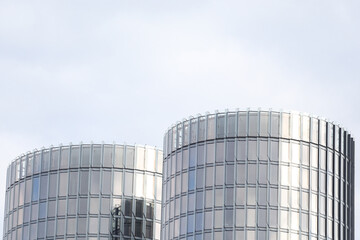 Close-up detail photo shot of modern round type architecture skyscrapers.