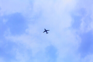 Wide-body civil aviation aircraft flying in the scenic sky