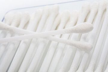 cotton buds in box on white background
