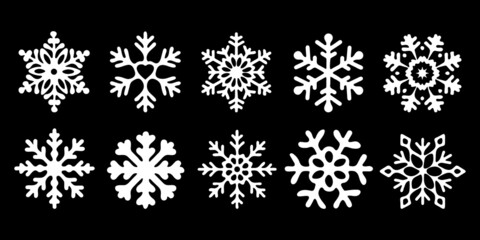White Snowflakes on a black background. Isolated elements in a flat style. Stylish set for your New Year or Christmas design. Vector illustration.