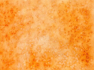 Bright autumn watercolor textured background of yellow-orange color with speckles. Banner