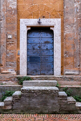 TUSCANY-MAY 30:an old wooden door in Pienza,Tuscany,on May 30,2018.