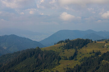 mountain slopes in the Ukrainian Carpathians. mountain tops and forests on a background of blue sky