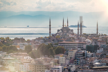 Fototapeta premium ISTANBUL, TURKEY - OCTOBER 12 ,2021: Istanbul city view on Hagia Sophia in Turkey. Golden Horn bay of Istanbul and view on mosque with Sultanahmet district. aerial view