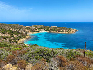 Fototapeta na wymiar Cala D'Oliva at Asinara Island. Sardinia beach during summer, with turquoise paradise beach. Sardinian beach.