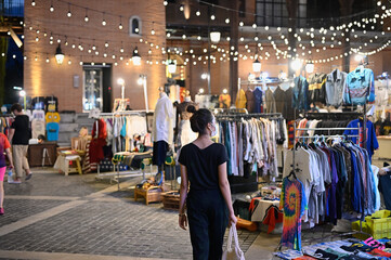 Series photo of young women shopping in night street market , Chaing mai north of thailand