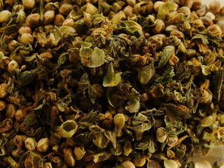 Marijuana seeds and their cases / casings from a studio shoot.