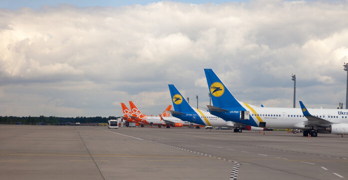 Ukraine, Kyiv - July 8, 2020: Passenger aircraft. Boryspil International Airport. Many different planes in terminal D. Apron runway.