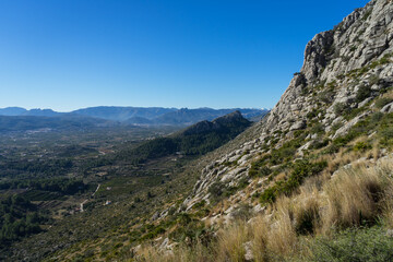 Fototapeta na wymiar beautiful mediterranean mountain landscape and blue sky in Spain hike and relaxation in nature