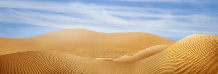 Fototapeta na wymiar Picturesque view of sandy desert and blue sky on hot sunny day. Banner design