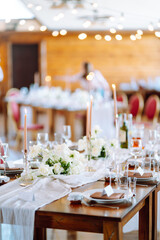Festive table. Banquet table with wedding and festive serving. Wedding, birthday, party, event concept.