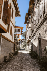 Turkey Safranbolu historic street and houses. Stone roads and wooden ottoman mansions. Safranbolu UNESCO World Heritage Site.