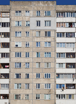 Main facade of multi-apartment large-panel residential building soviet architecture houses.