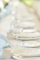 Table set for an event party or wedding reception. Banquet table design.
