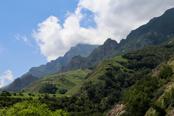 Obraz premium clouds over the beautiful green Caucasus mountains landscape