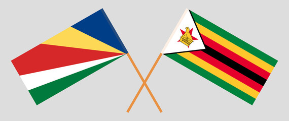 Crossed flags of Seychelles and the Republic of Zimbabwe. Official colors. Correct proportion