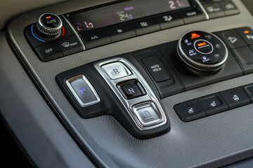 Modern car automatic gearbox. Gearbox control buttons. Gear selector close up.