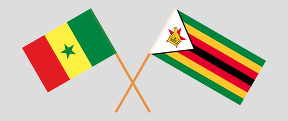 Crossed flags of Senegal and the Republic of Zimbabwe. Official colors. Correct proportion