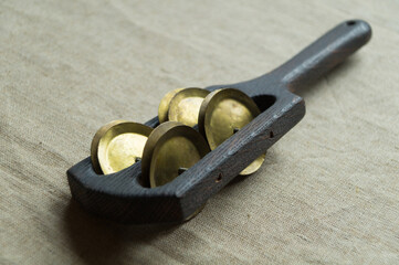 Black rhythm clapper (rumba, pandeiro) - a noise wooden percussion folk musical instrument...