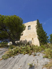 Notre Dame du Château in Allauch with an old stone tower.