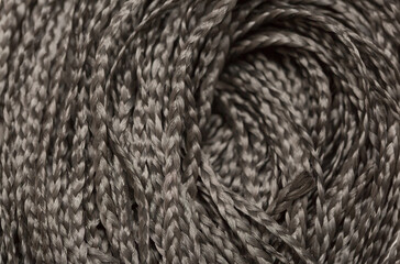 Afrokos, Dreadlocks close-up. Braided by a master hairdresser in the salon, hair braided in dreadlocks. African braids on a white background.