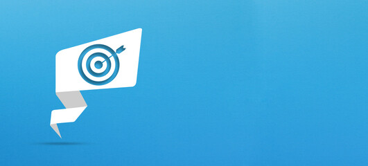 Target sign with speech bubble on blue background