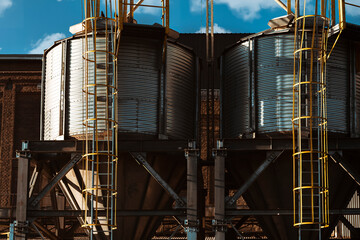 Front view of a pair of silos of a flour factory a country town near Cordoba Argentina
