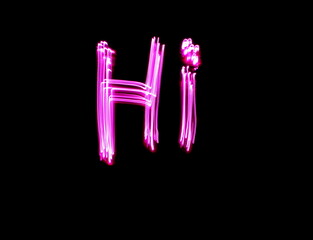 Obraz premium Long exposure photograph of neon colour in an abstract swirl, parallel lines pattern against a black background. Light painting photography.