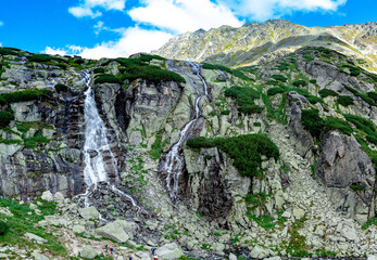 Panoramic view of Skok waterfall and the lake in the western part of High Tatras, Slovakia - obrazy, fototapety, plakaty