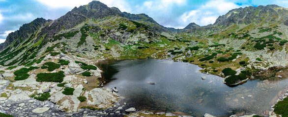Panoramic view of Skok waterfall and the lake in the western part of High Tatras, Slovakia