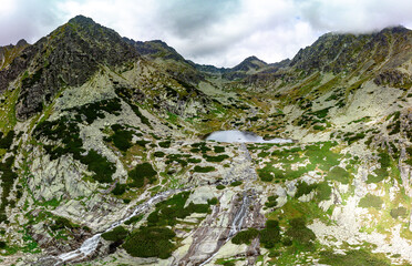 Panoramic view of Skok waterfall and the lake in the western part of High Tatras, Slovakia © Martin Valigursky