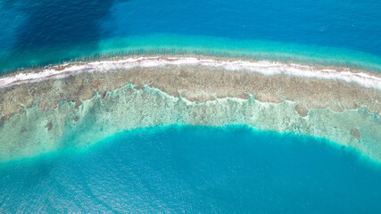 Fototapeta na wymiar Aerial view of coral reef and atoll in French Polynesia. 