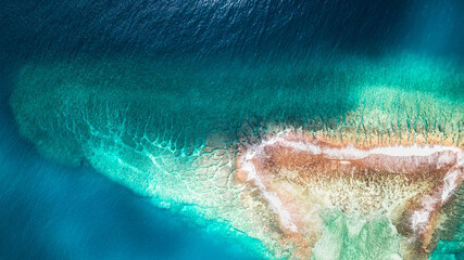 Aerial view of coral reef and atoll in French Polynesia. 