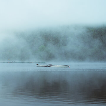 Boats on Lake in Fog