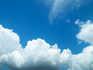 Naklejka na ściany i meble Sunny day with white clouds