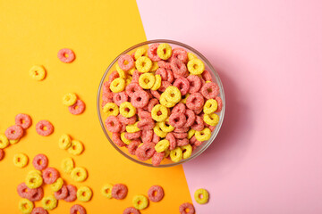 colored corn rings for breakfast on the table close-up