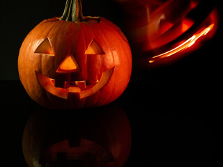 Halloween pumpkins on black background