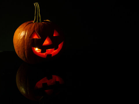 Halloween pumpkins on black background