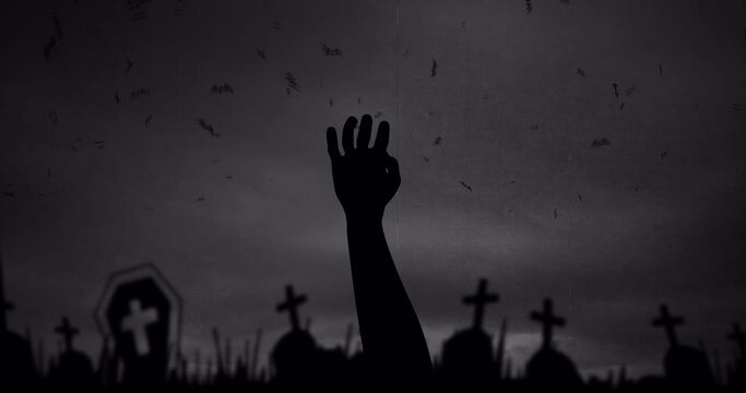 Animation of halloween hand, bats and cemetery on grey background