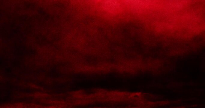 Animation of dark, stormy halloween red sky