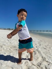 boy playing on the beach