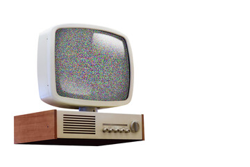 An old fashion television on a white background with noise on the screen.