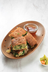 Martabak Telur is Popular Street Food in Indonesia. Egg, Spring Onion Wrapped with Thin Flour Batter