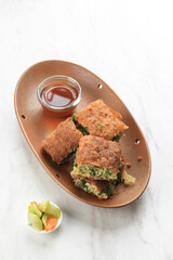 Martabak Telur is Popular Street Food in Indonesia. Egg, Spring Onion Wrapped with Thin Flour Batter