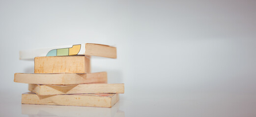 stack of old books isolated on white background copy space