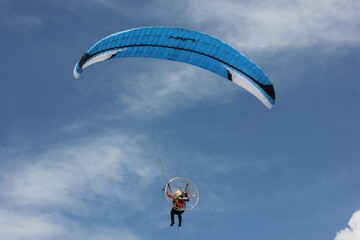 picture of a kite hanging from the sand dunes on the beach of the famous city of Yogyakarta in Indonesia