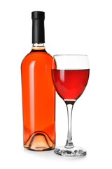 Glass and bottle of delicious red wine on white background