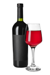 Glass and bottle of delicious red wine on white background
