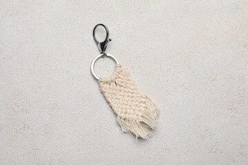 Handmade cotton keychain on light background