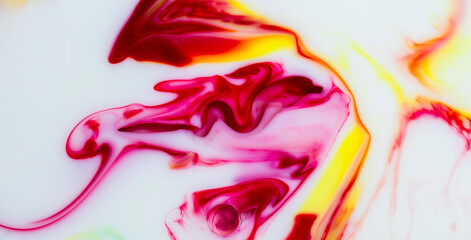 Abstract colourful  background of shadowy swirls with an abstract pattern texture created by a mixture of paint and a milk on water surface.